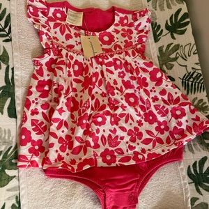 First Impressions onesie. New with tags